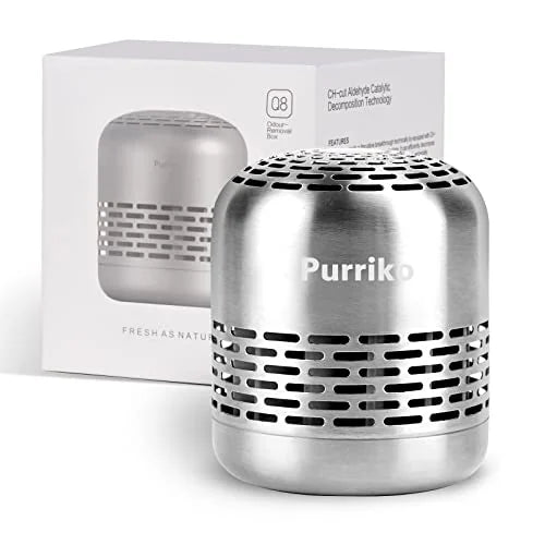 Purriko odor eliminator in brushed silver metal casing with rounded top and horizontal ventilation slots. White brand logo on front. Shown beside its white retail box labeled 'Q8 Odour Removal Box' and 'CH-cut Aldehyde Catalytic Decomposition Technology'.