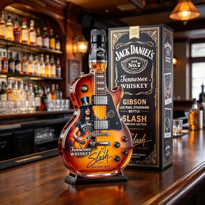 Guitar-shaped glass decanter. Two empty bottles per set; liquor not included.