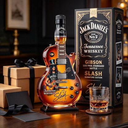 Guitar-shaped glass decanter. Two empty bottles per set; liquor not included.