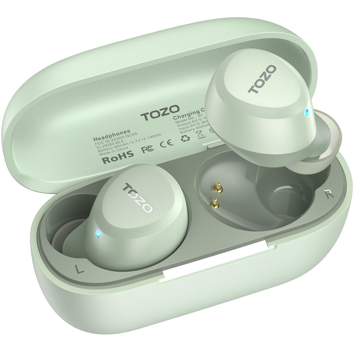 TOZO-branded true wireless earbuds in mint green, shown outside their open charging case. Both earbuds display small blue LED indicators. The case interior shows gold charging pins and L\/R labels. Regulatory text visible inside lid.