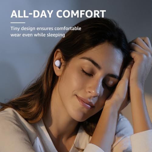 Promotional lifestyle image of small white wireless earbuds worn in-ear by a person resting with eyes closed. Text reads 'ALL-DAY COMFORT' and 'Tiny design ensures comfortable wear even while sleeping.', 3+ more images are available