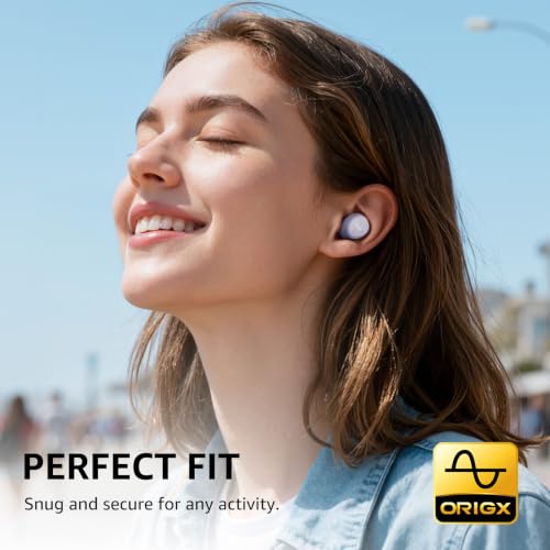 Smiling woman wearing light purple wireless earbuds outdoors against a blue sky. Text reads 'PERFECT FIT - Snug and secure for any activity.' ORIGX logo in bottom right corner.