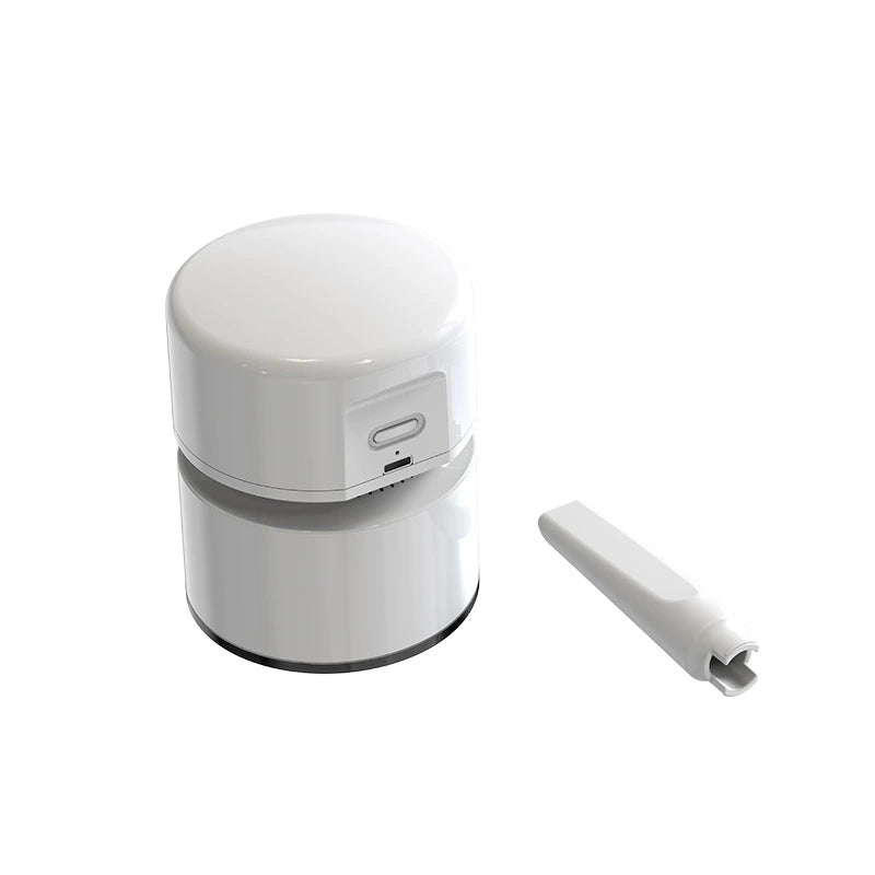 White mini desktop vacuum with short nozzle