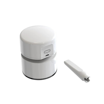 White mini desktop vacuum with short nozzle