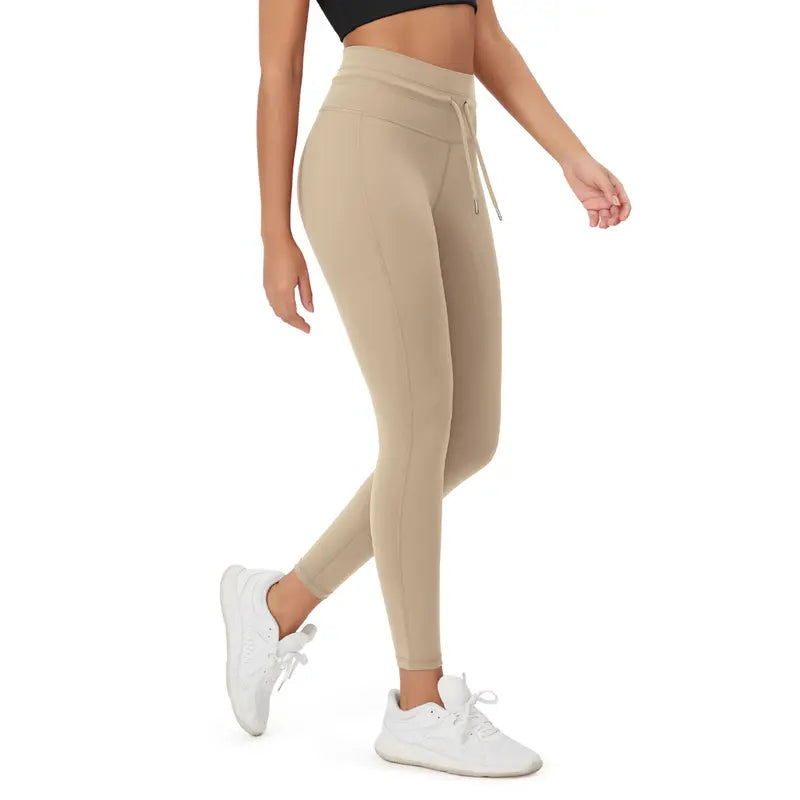 Beige high-waist drawstring leggings